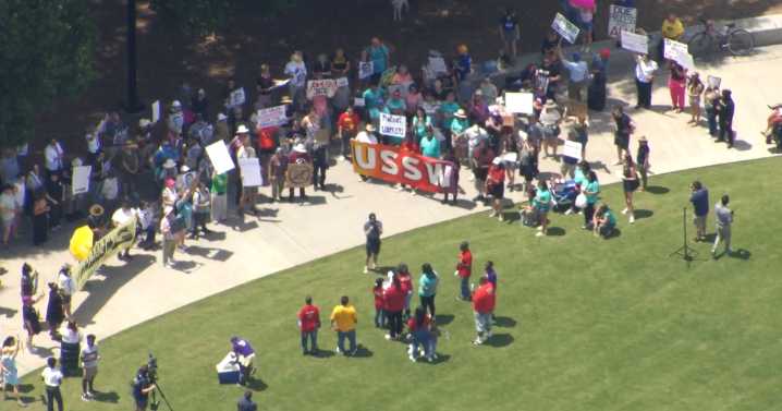 Rally held in Raleigh's Moore Square against ICE raids following LA protests, mass arrests :: WRAL.com