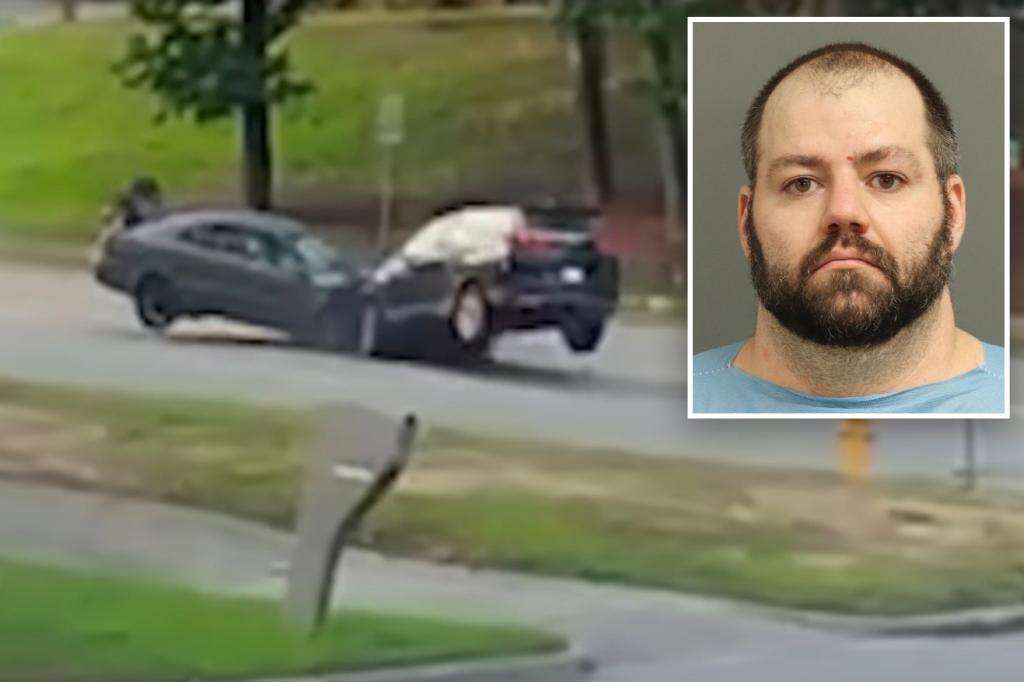 Moment husband allegedly tries to kill wife in head