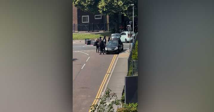LIVE Police scrambled to 'serious disorder' as group of 'up to 60 youths' block Salford road