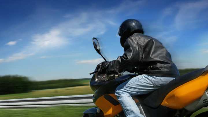What It Means When A Biker Points Their Thumb Toward Their Mouth