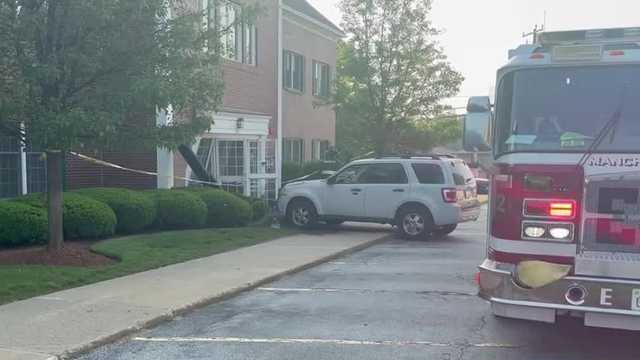 Car crashes into Manchester building that houses physical therapy center