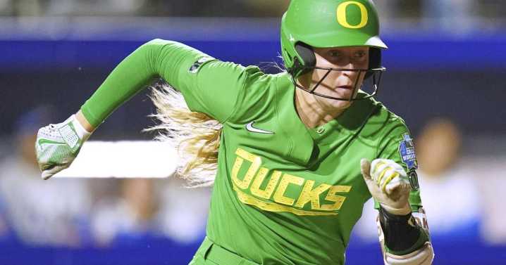 Here's dirt in your eye. Freak pitch strikes airborne clod, and Oregon softball catcher pays price