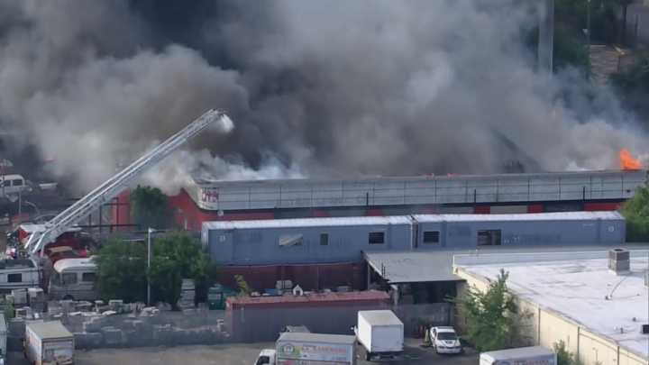 Houston fire: Firefighters battling large building fire near North Freeway