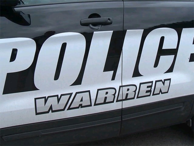 Suspect accused of setting tree on fire in Warren