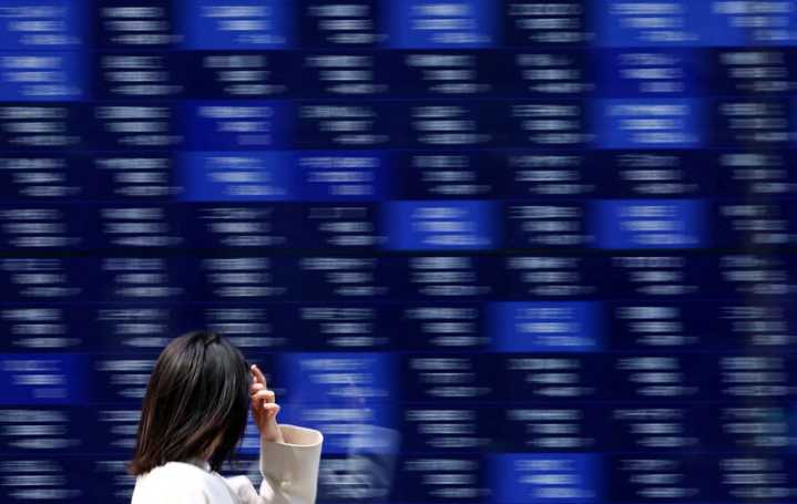 Stocks on guard for payrolls, Tesla tumbles as Trump