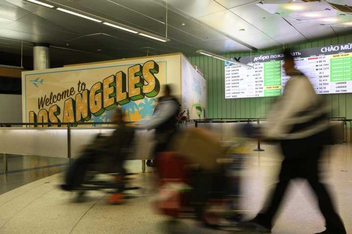 Trump’s new travel ban takes effect as tensions escalate over immigration enforcement
