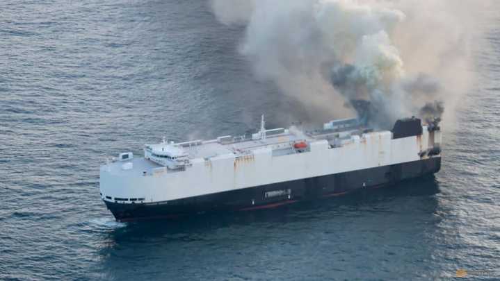 Burning cargo ship carrying 3,000 vehicles abandoned off Alaska