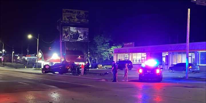 Car flips over, one sent to hospital after late night crash