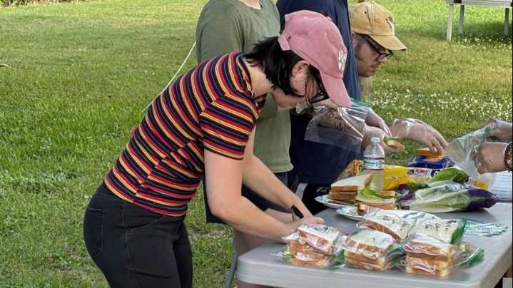 Volunteers make sandwiches to 'Fill the Fridge' on Government Street