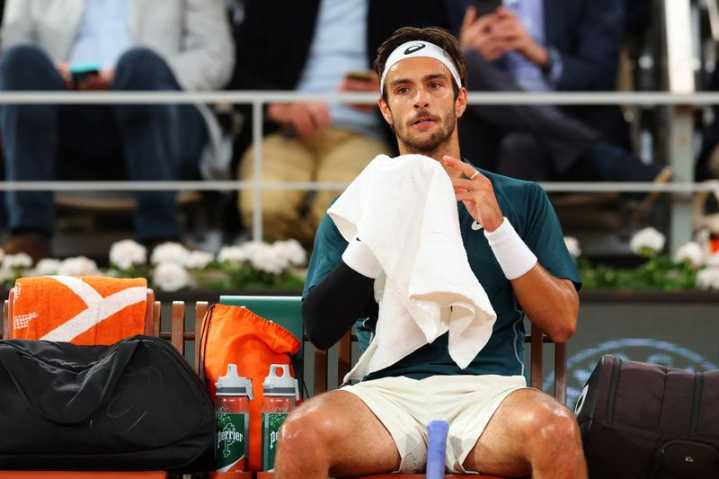 Tennis-Relentless clay season catches up with Musetti in Paris semi