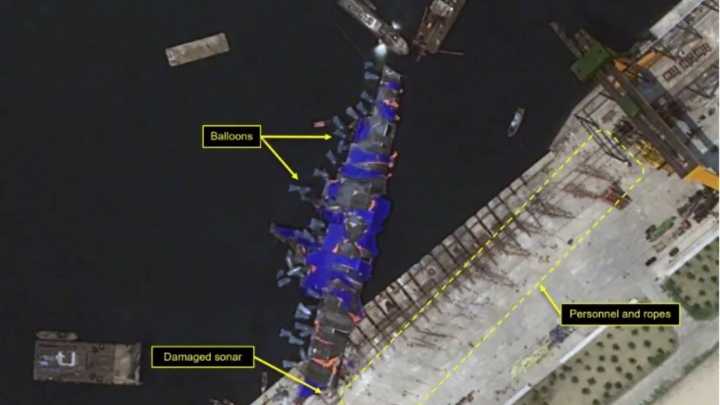 North Korea’s half-sunk warship hauled UPRIGHT with giant balloons as cause of disaster that humiliated Kim is revealed