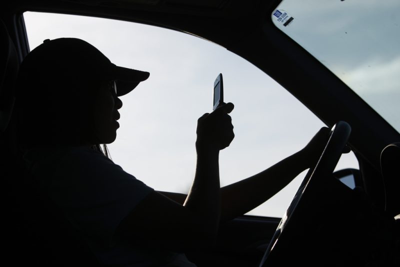 Holding a cellphone for navigation while driving is illegal, California court rules