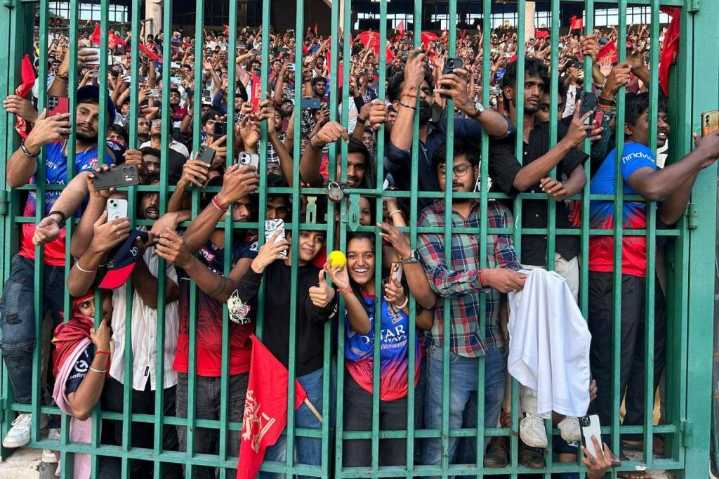 At least 11 people die in a stampede outside a cricket stadium in India after IPL win