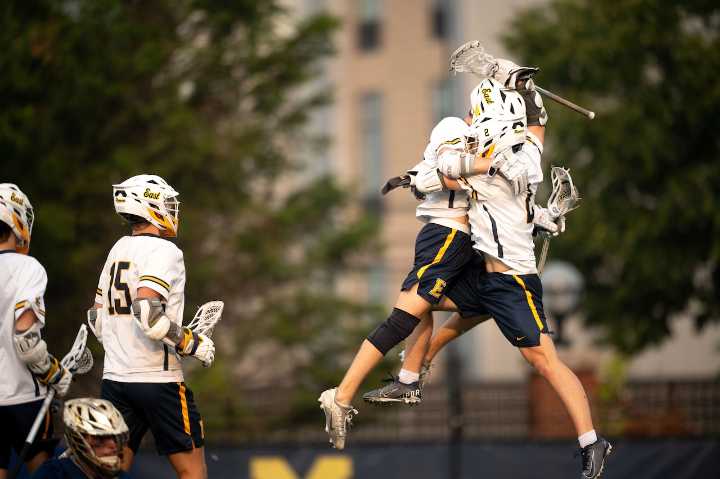 See photos as East Grand Rapids battles Detroit Country Day in the D2 boys lacrosse state championship