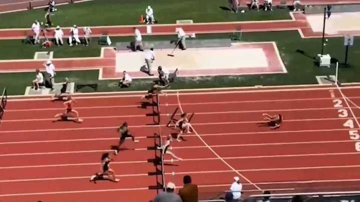 Video shows Oregon track star somersaulting over finish line