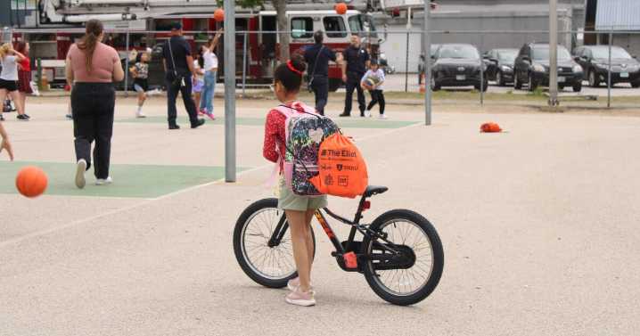 Manchester fourth graders earn refurbished bikes, basketballs and helmets