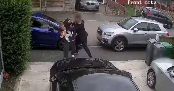 Horrific moment dad was randomly attacked in the street while carrying his daughter