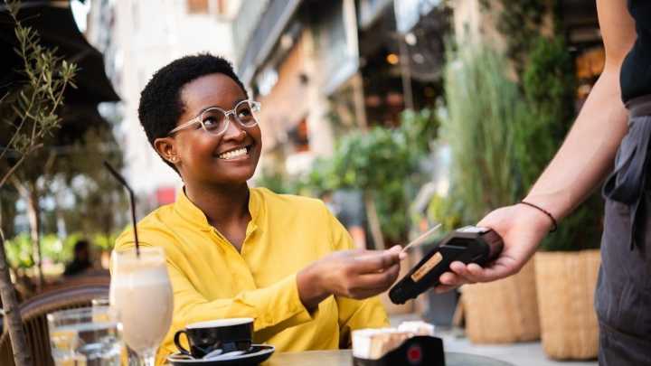 Why do some stores have credit card minimums?