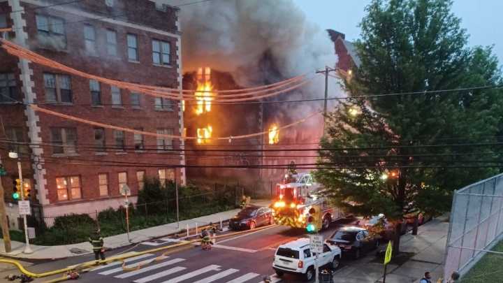 Crews working to put out massive fire at vacant Philly building
