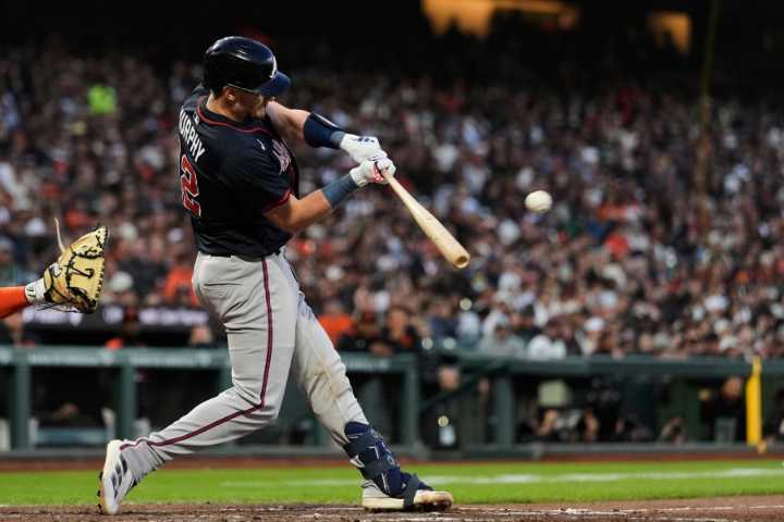 A ball thrown from the stands causes moment of confusion in Braves