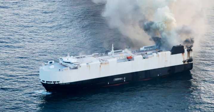 22 crew members rescued from lifeboat in North Pacific after ship carrying 3,000 cars catches fire