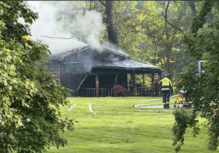 Flames rip through building in Canfield, Route 62 closed