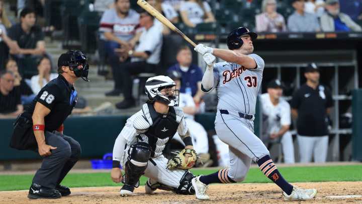 Carpenter hits 3 homers as the Tigers reach 40 wins by pounding the White Sox 13