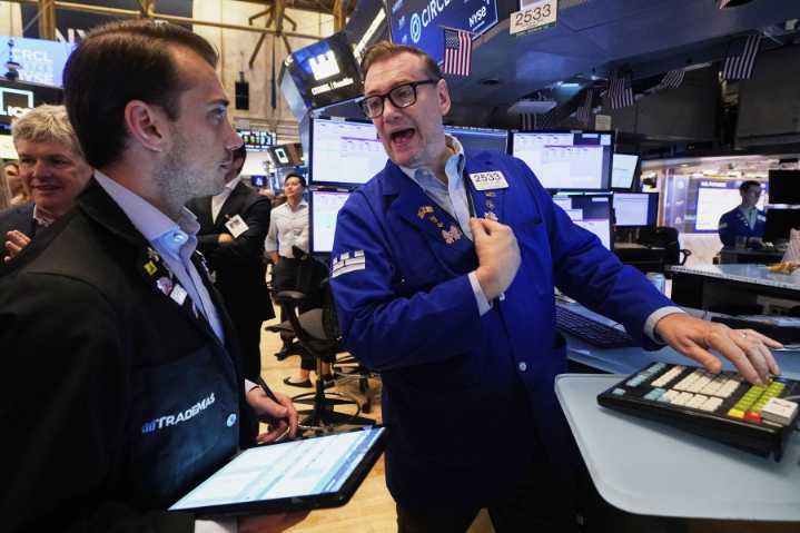 Wall Street gains ground following a solid jobs report