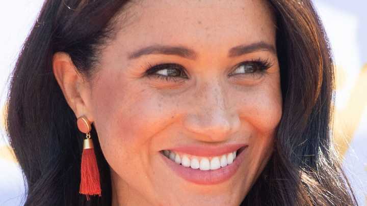 Meghan Markle wears her signature white jeans for a sweet Disneyland day out with Prince Harry and the children