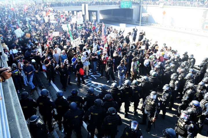 Photos: Weekend ICE protests ran the gamut from peaceful to violent. Here are some memorable images.