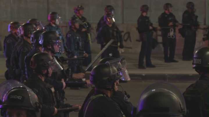 Flash-bangs, tear gas and arrests as ICE raids protests continue in Los Angeles
