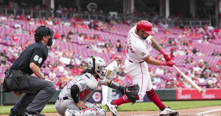 Reds top Diamondbacks in 10 in suspended game