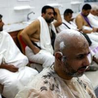 Inside Saudi's hajj-only barbershop, shaving thousands of heads in a day