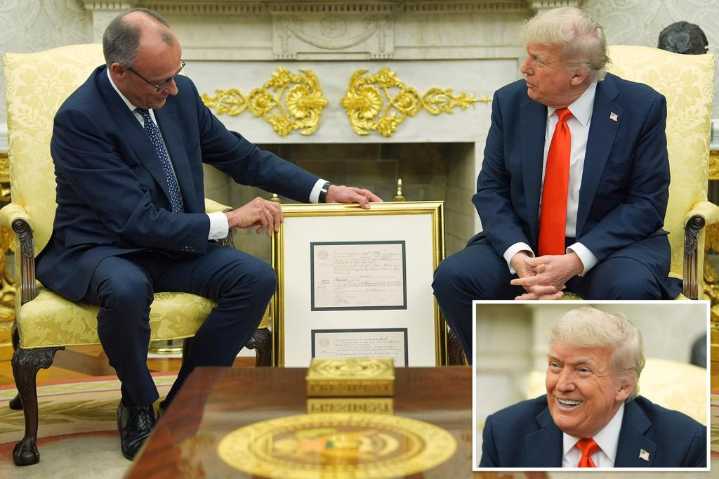 Trump gifted gold-framed copy of grandfather's birth certificate from German Chancellor Friedrich Merz