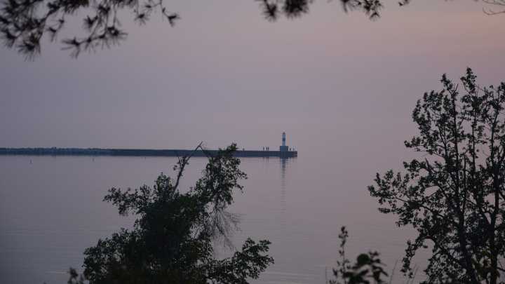 Hazy skies linger as wildfire smoke moves through Northern Michigan