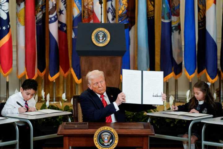 Trump cannot proceed with gutting US Education Department, court rules