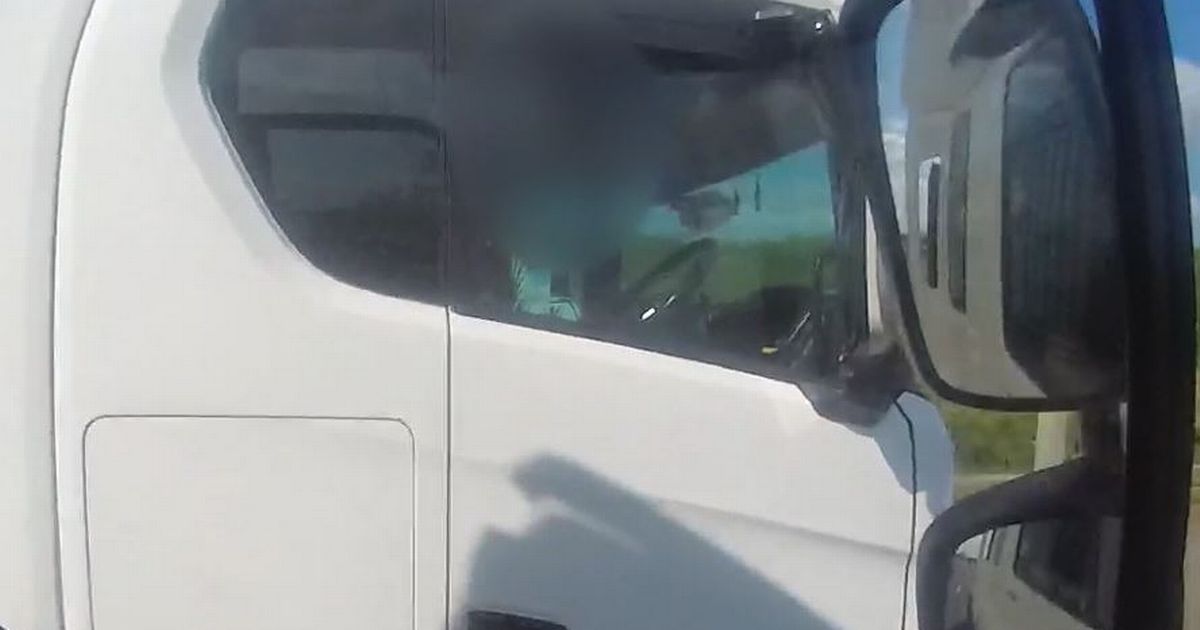 Watch M5 trucker roll cigarette with no hands on wheel as police go undercover in HGV