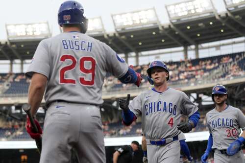 Happ homers, has 4 RBI on 3 hits as Cubs win seventh straight series
