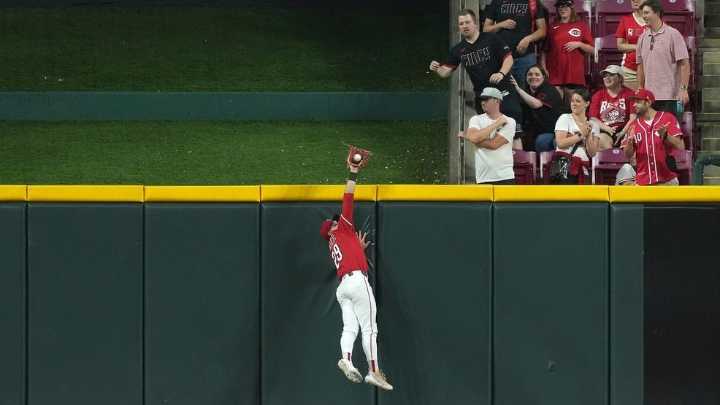 Friedl makes game-saving grab and Reds rally to snap Brewers' 8