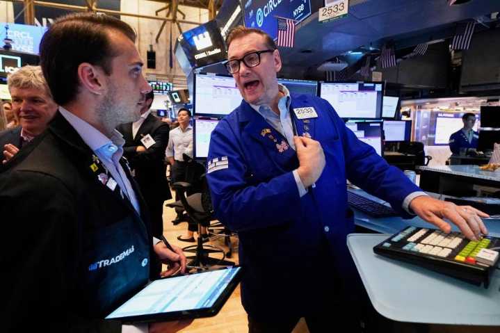 Wall Street gains ground following a solid jobs report