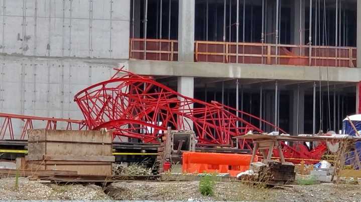 Giant crane collapse kills two workers