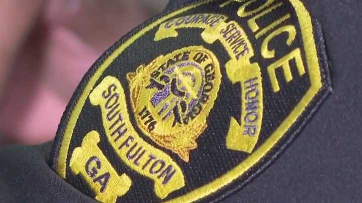 South Fulton officer hospitalized after collision; another driver arrested