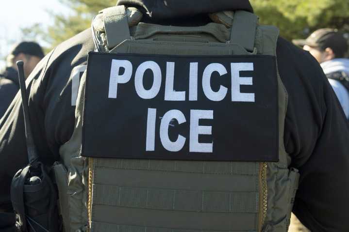 Migrants and ICE officers contend with heat, smog and illness after detoured South Sudan flight
