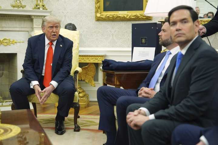 State Dept says current US visas from travel ban countries will not be revoked