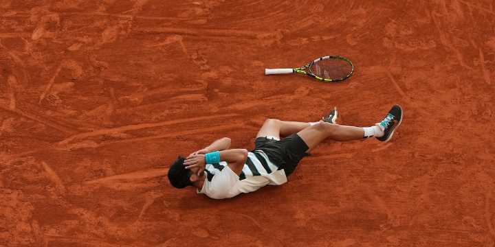 Alcaraz wins longest French Open final in five sets after saving 3 match points against Sinner