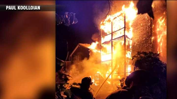Triple decker catches fire in Revere