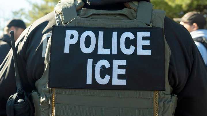 Migrants and ICE officers contend with heat, smog and illness after detoured South Sudan flight