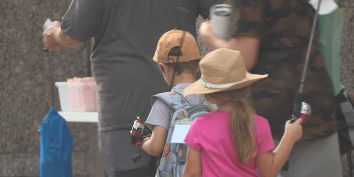 Family Fish day reels in new friendships at the George Bush Library Pond
