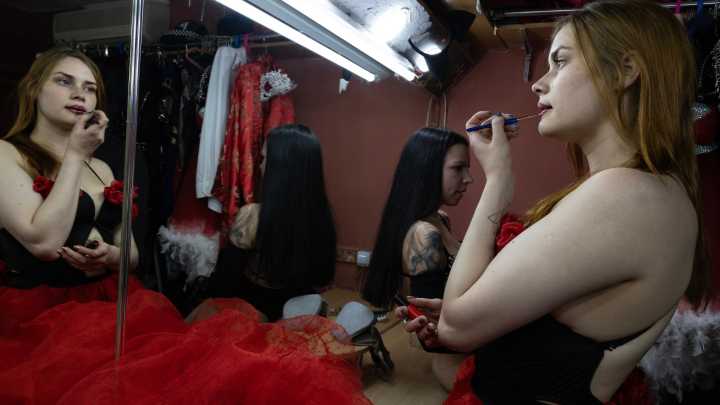 Inside the Ukrainian frontline strip club where brave dancers flout curfew to perform to punters enduring hell of war