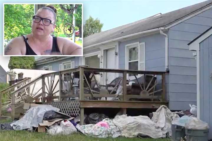 Virginia house of horror's yard bursting with 30 buckets of bathroom filth smells 'like you're in a toilet'